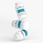 Three bottles of Ecovital Ayurvedic Complex on a white background