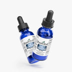 Two bottles of Ecovital Diet Drops on a white background