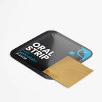 Gold oral strip in a black packaging tray with 'Ooral Strip' branding on a white background