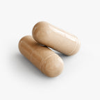 Two beige capsules on a white background