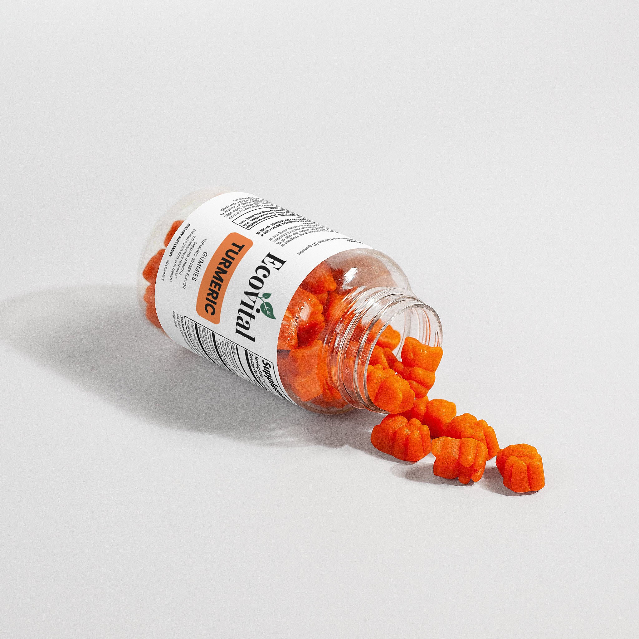 Open bottle of orange capsules with a label on a light gray background
